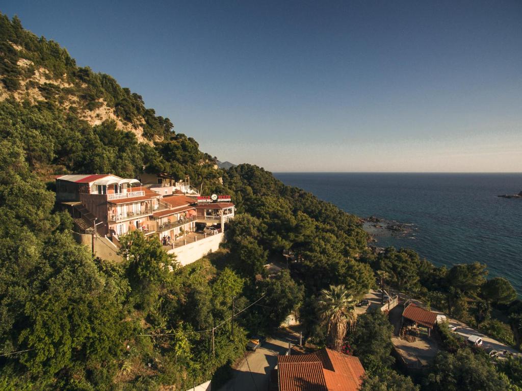 a town on a hill next to the ocean at Bella Vista Apartments in Pelekas