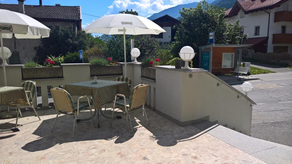A patio or other outdoor area at Hotel Krone