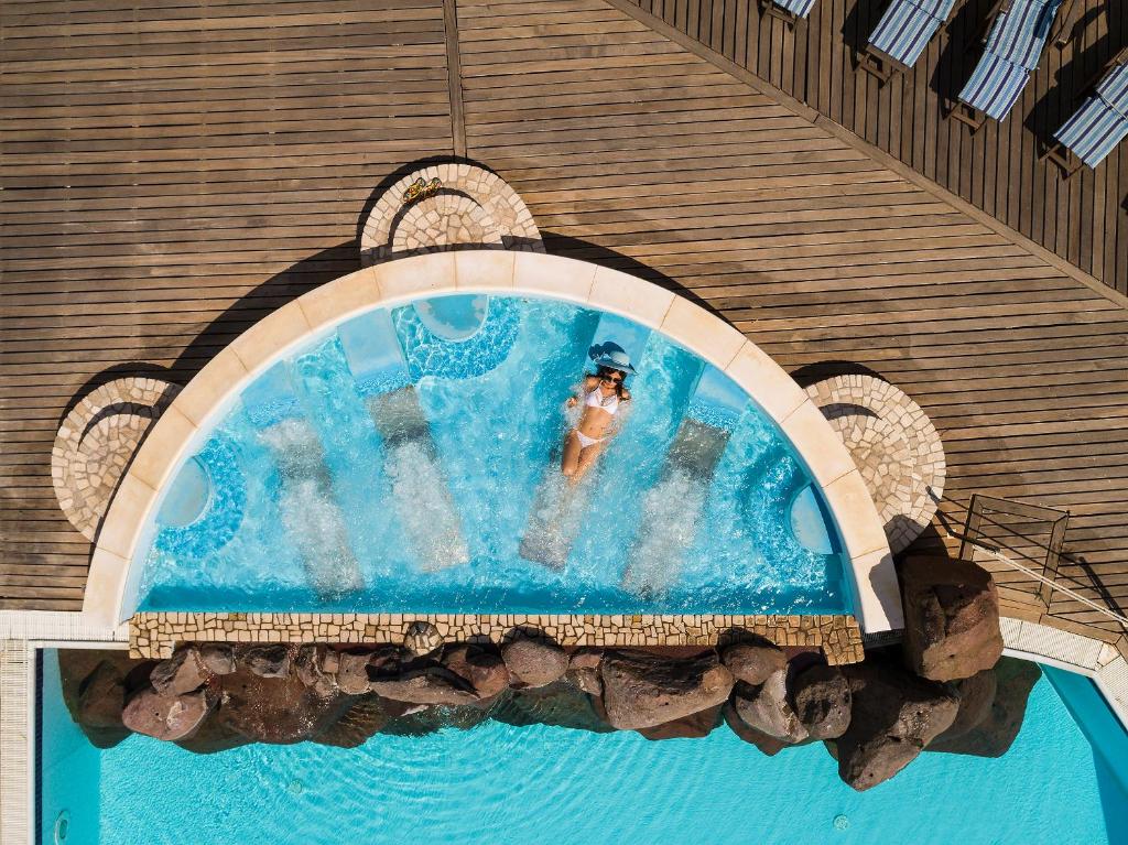 Bazén v ubytování Hotel Orsa Maggiore nebo v jeho okolí