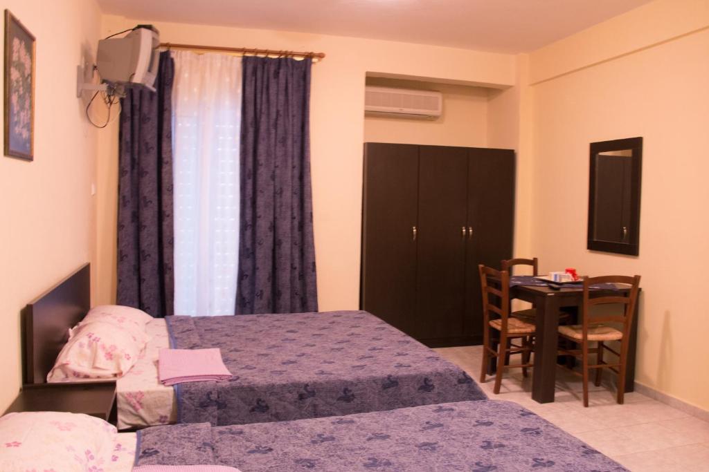 Postel nebo postele na pokoji v ubytování Filia Apartments