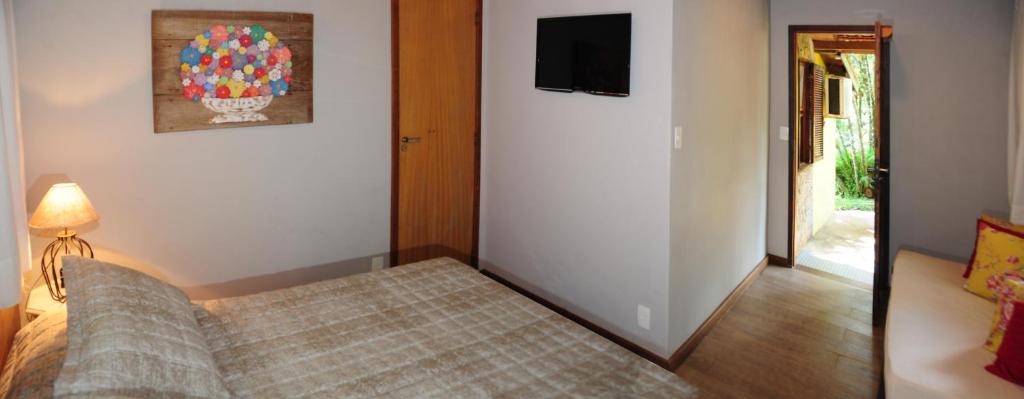 Postel nebo postele na pokoji v ubytování Hotel Daniela