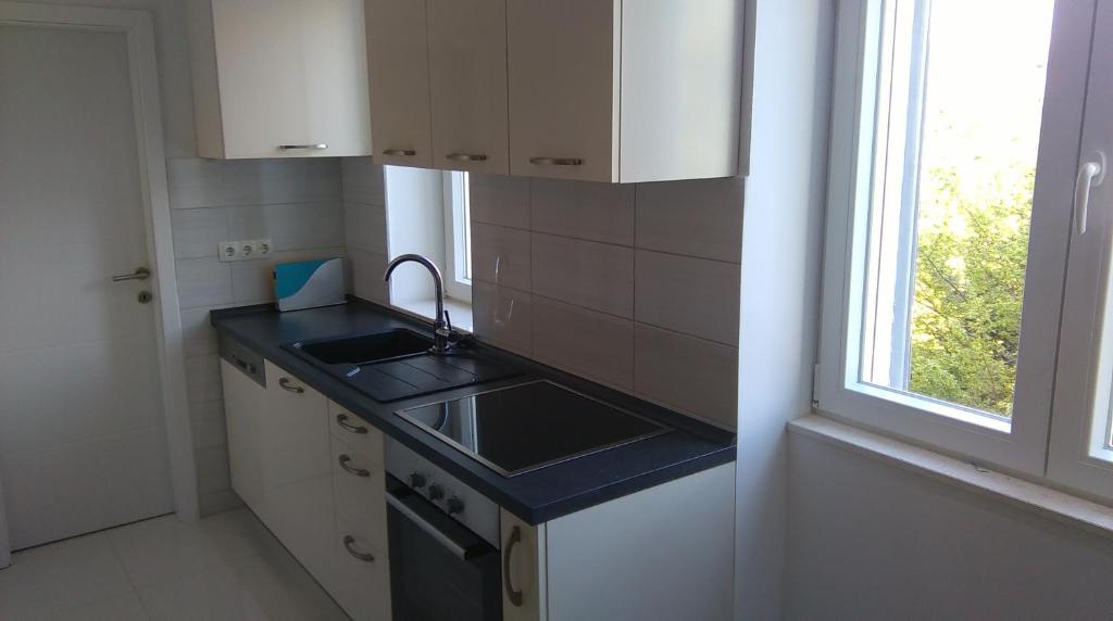 Kuchyňa alebo kuchynka v ubytovaní Centar Split Apartments Manuš