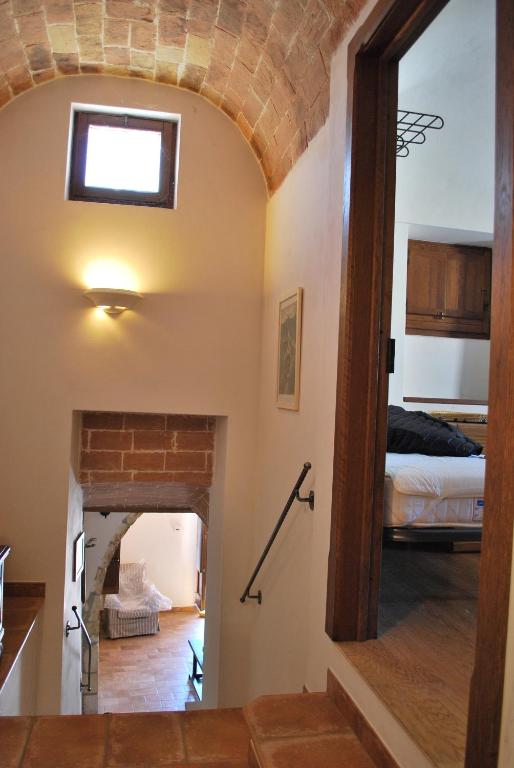 Łóżko lub łóżka w pokoju w obiekcie Stone House Ilovemajella