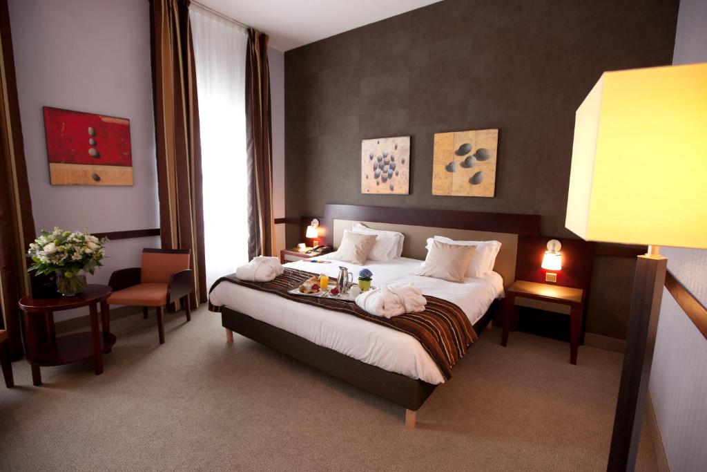 Llit o llits en una habitaci&oacute; de Alliance Lille - Couvent Des Minimes