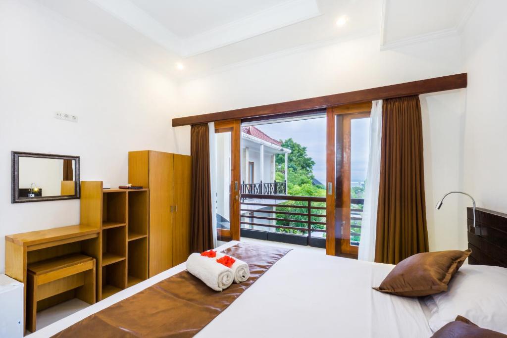Nyuh Gading Home Stay - Chambre Double De Luxe Avec Balcon Et Vue En Mer