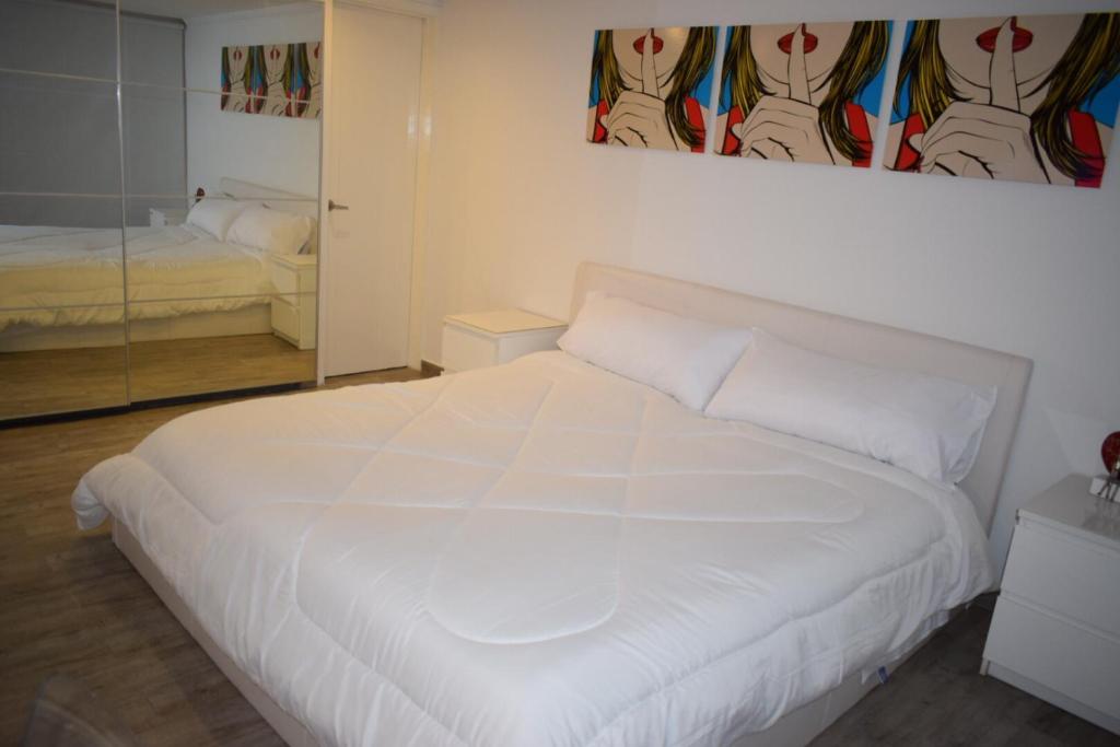 Postel nebo postele na pokoji v ubytování Blue Reef