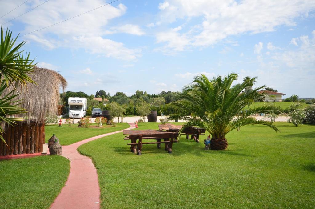 a park with a picnic table and a path at Villa Primavera in Latina