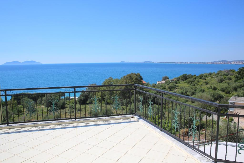 a balcony with a view of the ocean at Sea View Apartments in Vlorë