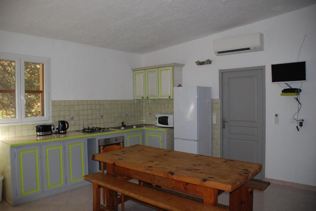 Una cocina o zona de cocina en Residence Ribellinu