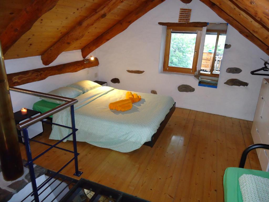 Postel nebo postele na pokoji v ubytování Casa Poiana