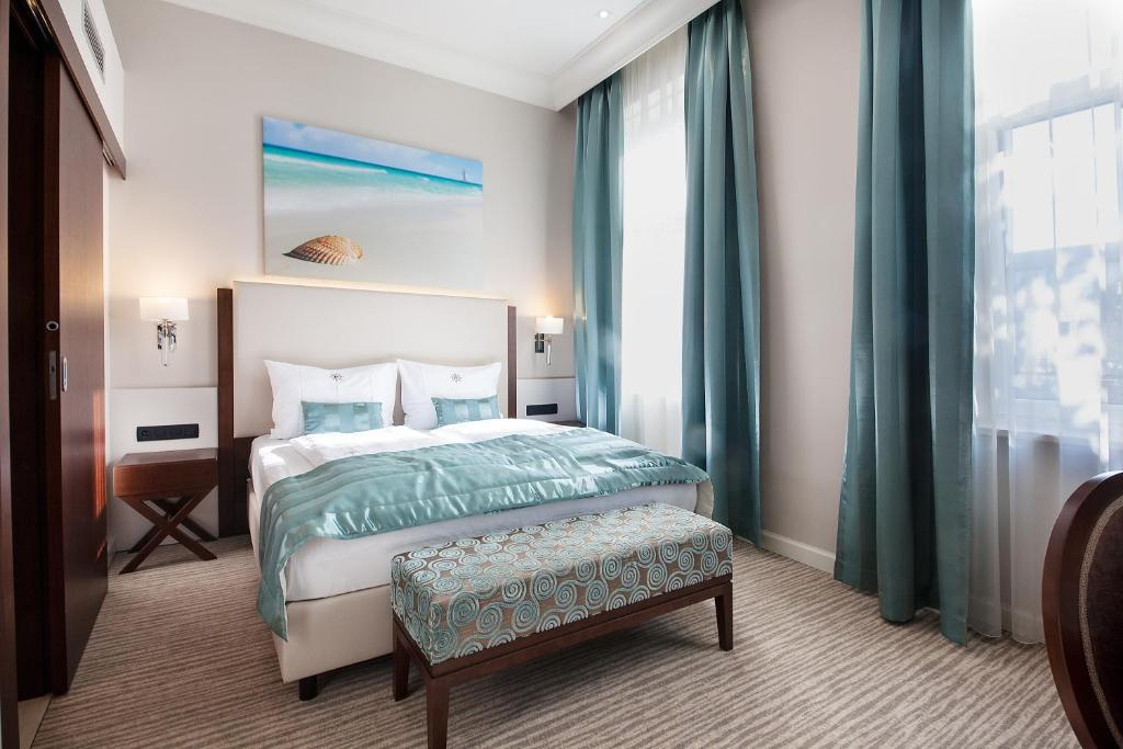 Posteľ alebo postele v izbe v ubytovaní Boutique Hotel Adria