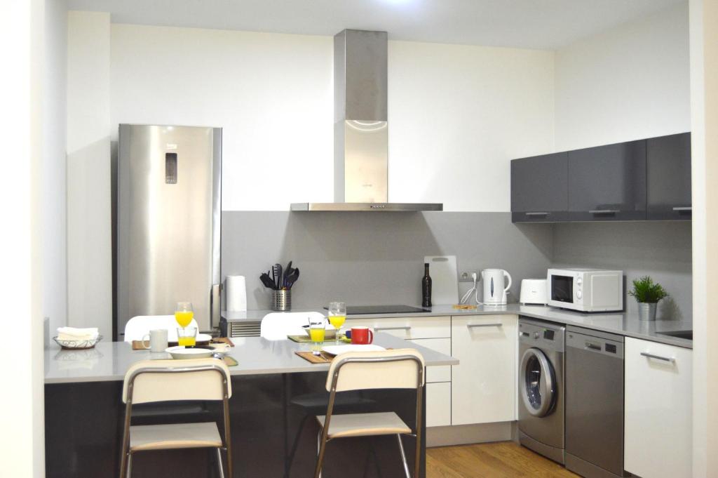 Apartamento Recreo Cadizにあるキッチンまたは簡易キッチン
