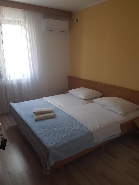 Postel nebo postele na pokoji v ubytování Rooms Hunter