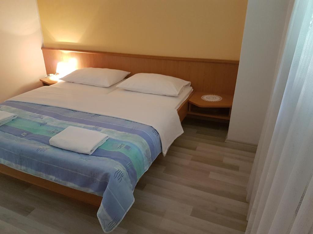 Postel nebo postele na pokoji v ubytování Rooms Hunter
