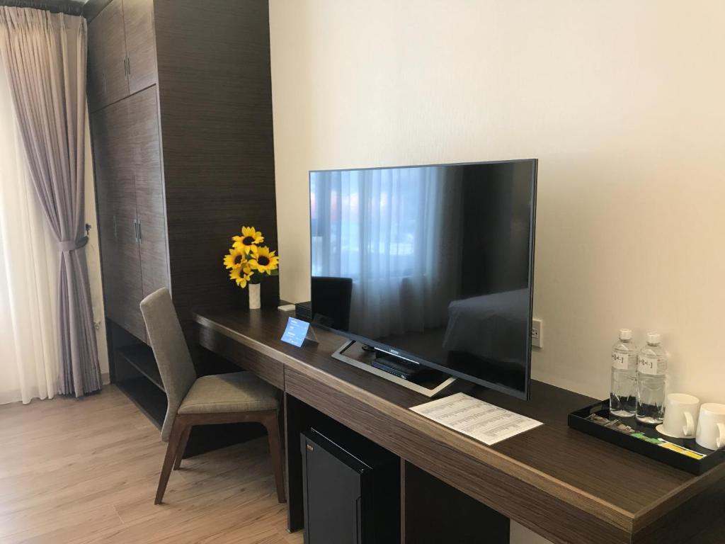 TV a/nebo společenská místnost v ubytování 晨光飯店