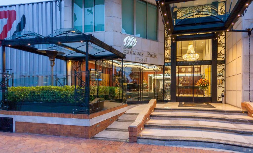 a store front of a building with a staircase in front at Hotel Embassy Park in Bogotá