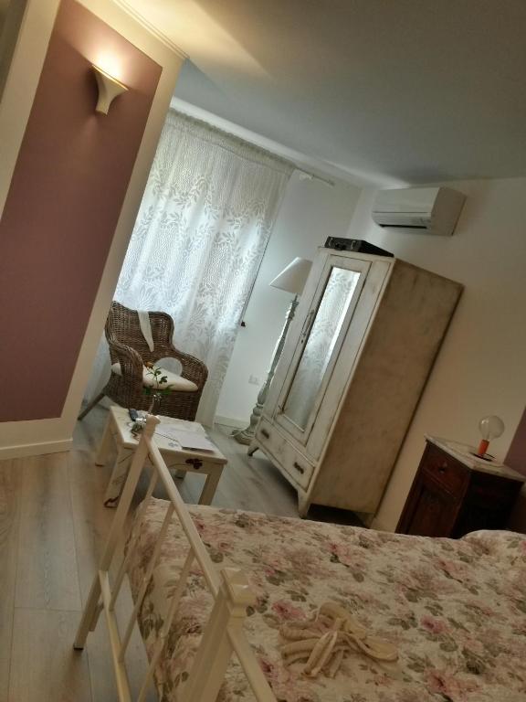 Łóżko lub łóżka w pokoju w obiekcie CasaVittorio