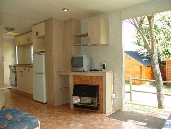 Kuchyň nebo kuchyňský kout v ubytování Camping Ribera del Ara