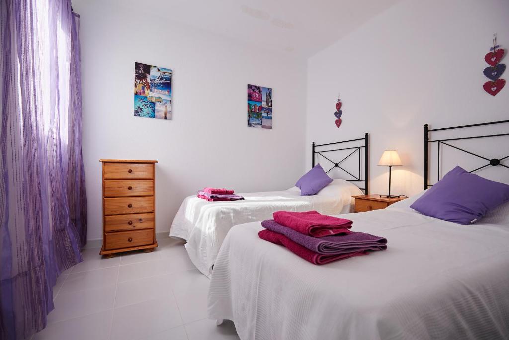 Posteľ alebo postele v izbe v ubytovaní Knights Apartment