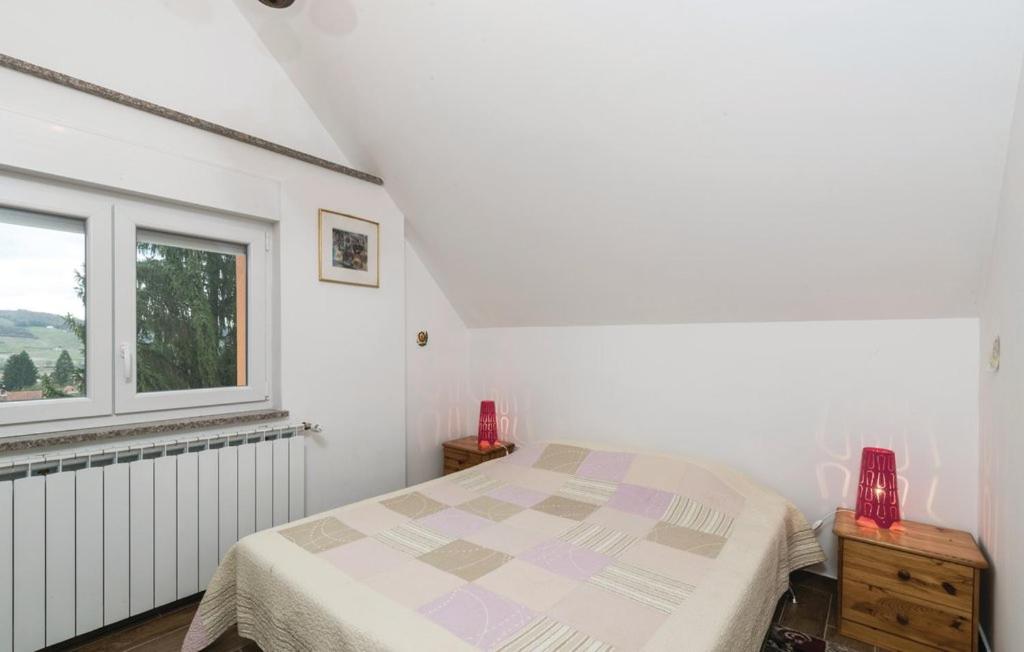 Postel nebo postele na pokoji v ubytování Villa Lorena