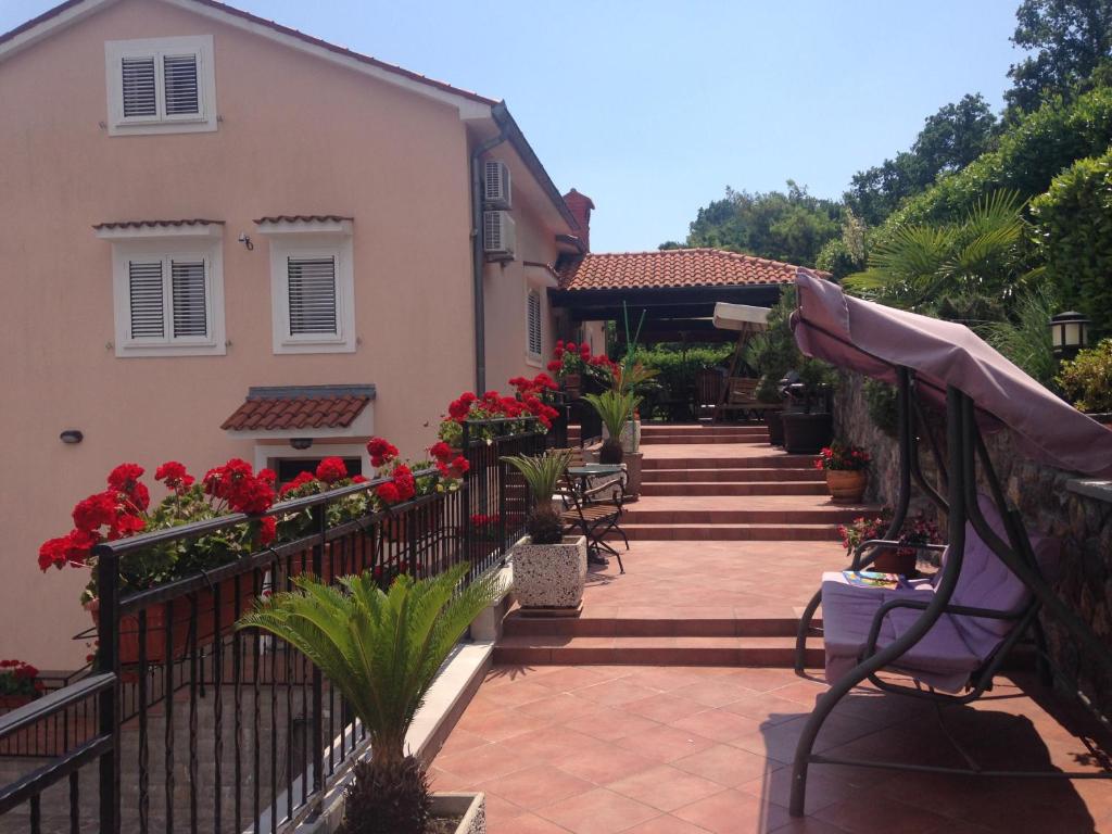 Vonkajšia záhrada v ubytovaní Apartments Vunić