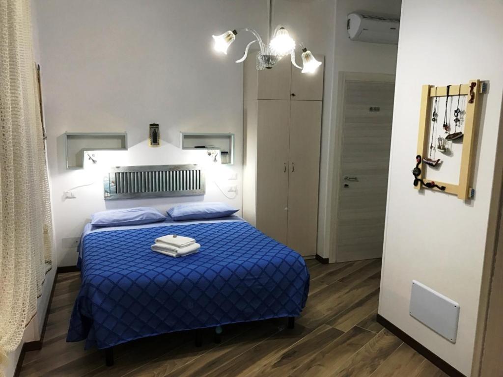Postel nebo postele na pokoji v ubytování B&B Castello