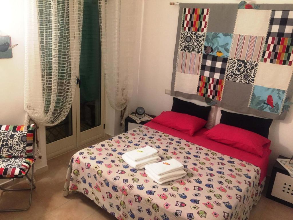 Postel nebo postele na pokoji v ubytování B&B Castello