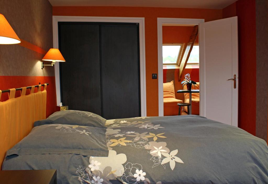 Postel nebo postele na pokoji v ubytování Hostellerie De La Mer