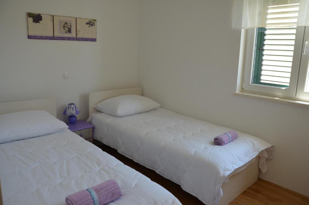 Łóżko lub łóżka w pokoju w obiekcie Villa ForTudor