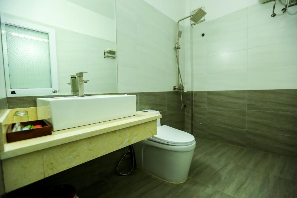 Koupelna v ubytování Viet Huong Hotel