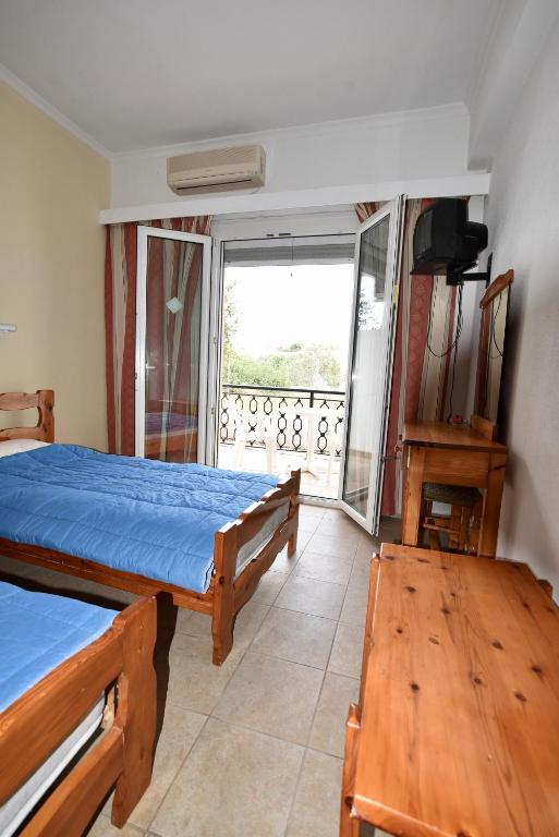 Postel nebo postele na pokoji v ubytování Hotel Galaxy