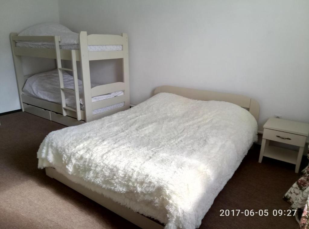 Postel nebo postele na pokoji v ubytování Village