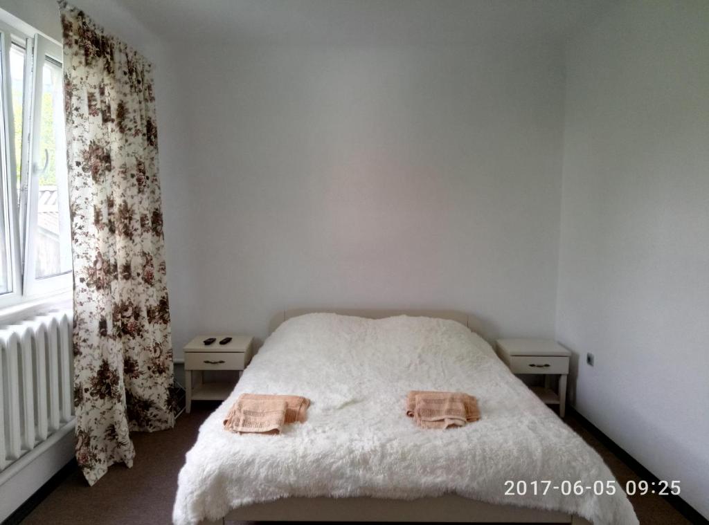 Postel nebo postele na pokoji v ubytování Village