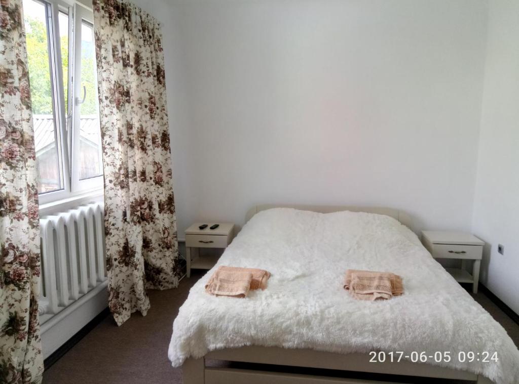 Postel nebo postele na pokoji v ubytování Village