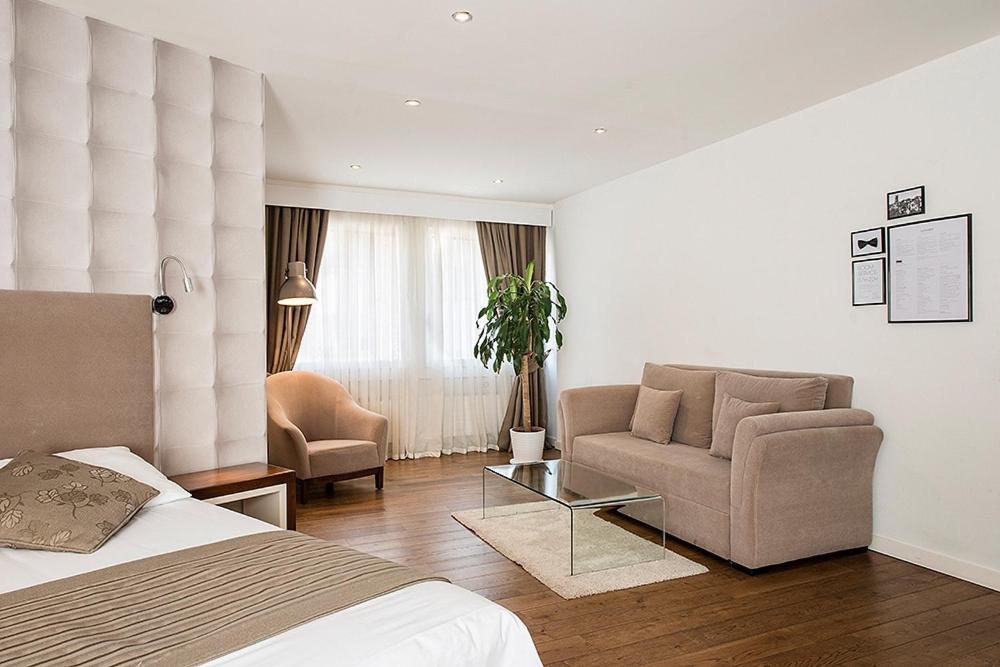 Χώρος καθιστικού στο Hotel Alpha