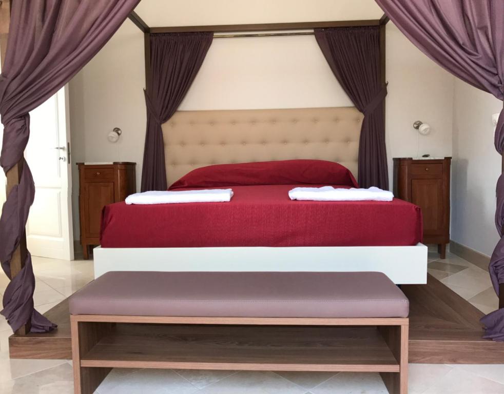 Postel nebo postele na pokoji v ubytování Palazzo Massari