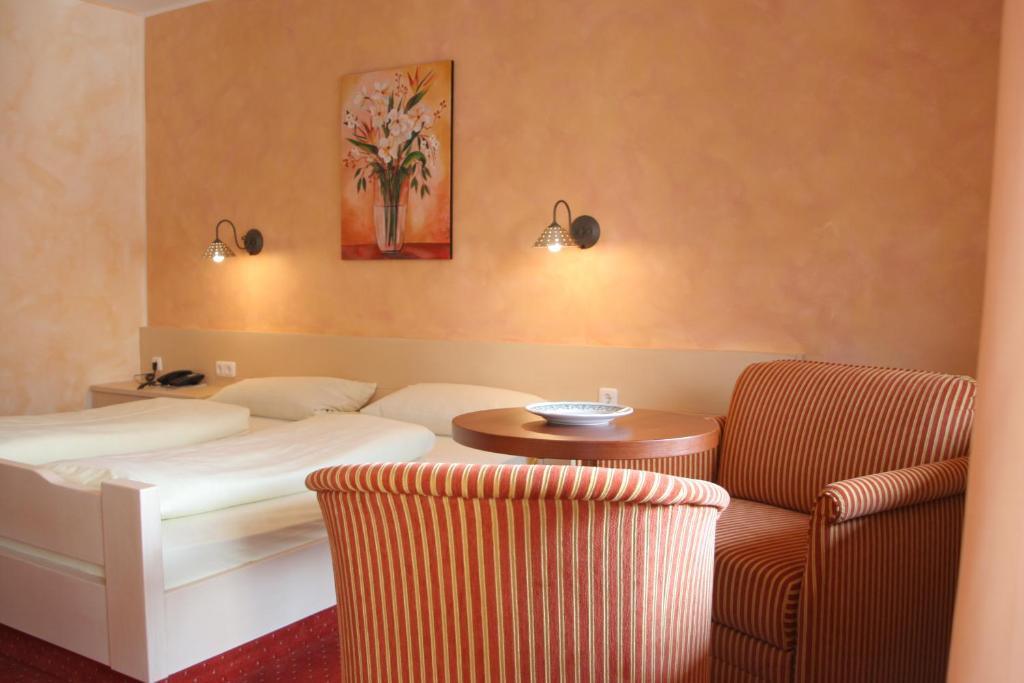 Postel nebo postele na pokoji v ubytování Hotel Keindl