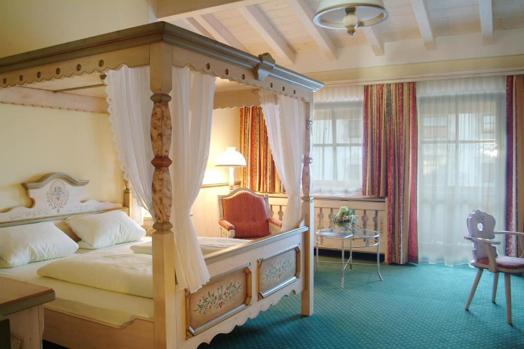 Postel nebo postele na pokoji v ubytování Hotel Keindl