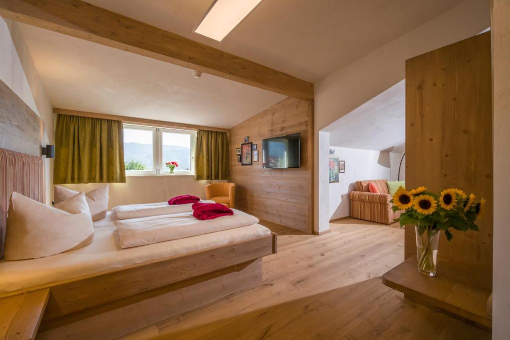 Postel nebo postele na pokoji v ubytování Hotel Keindl