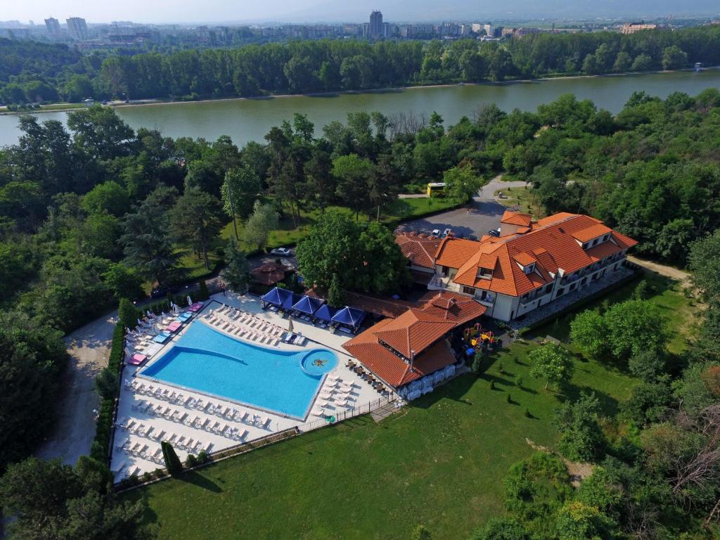 an aerial view of a house with a swimming pool at Hotel Ostrova in Plovdiv