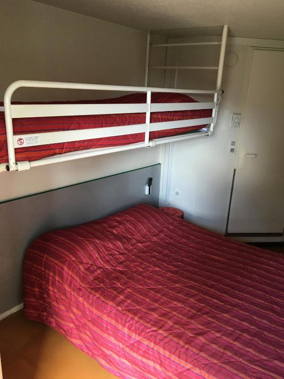 Postel nebo postele na pokoji v ubytování Premiere Classe Lyon Sud - Chasse Sur Rhône