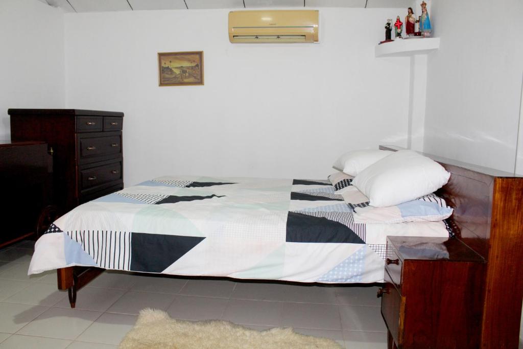 Postel nebo postele na pokoji v ubytování Fortune Rest Villa