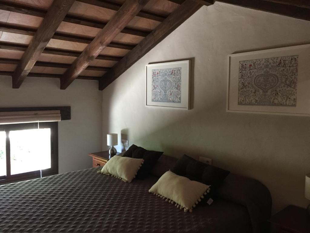 Postel nebo postele na pokoji v ubytování Casa Rural Aldea Chica
