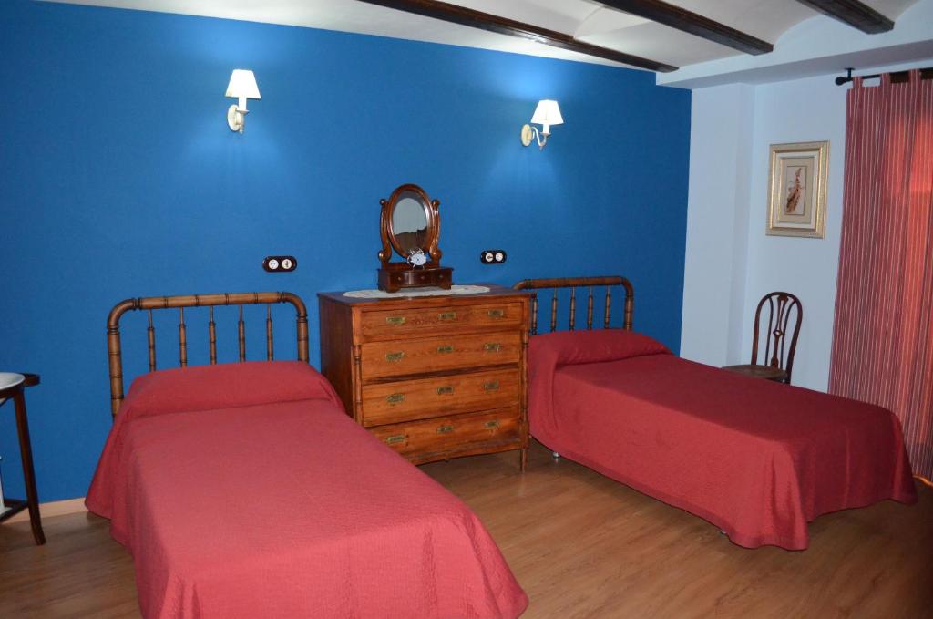 Postel nebo postele na pokoji v ubytování Casa Rural Teresa