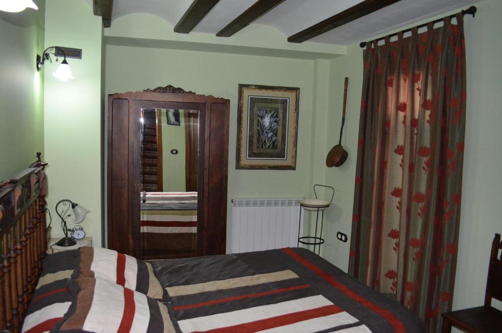Postel nebo postele na pokoji v ubytování Casa Rural Teresa