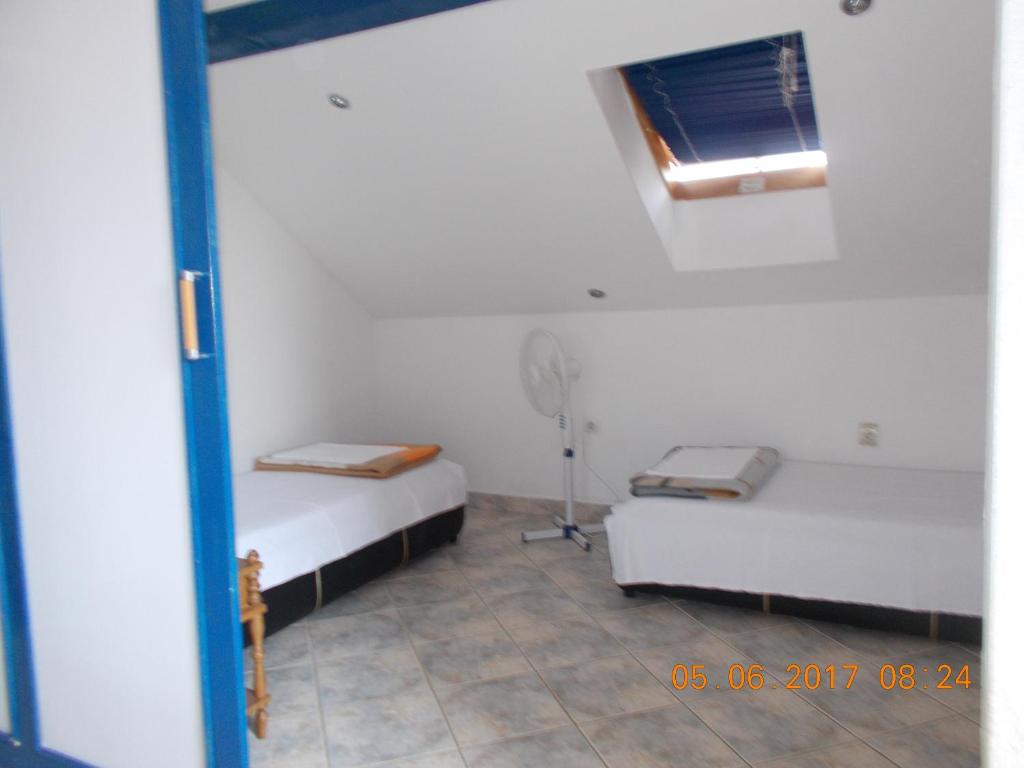 Postel nebo postele na pokoji v ubytování Apartments 031