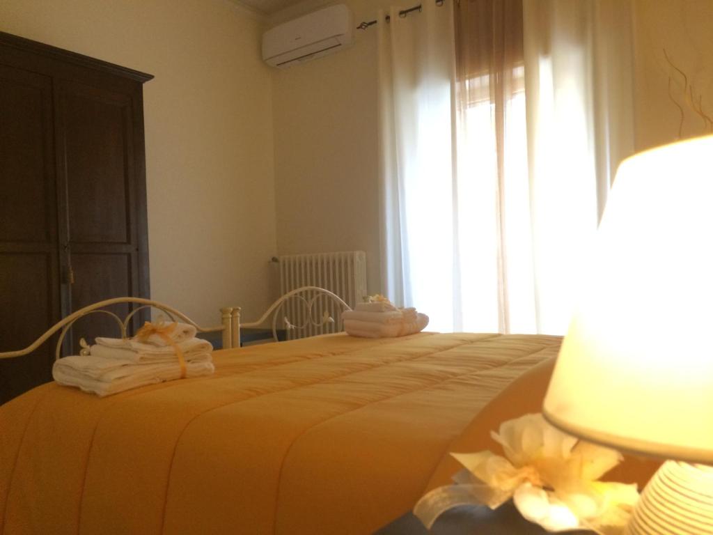 Postel nebo postele na pokoji v ubytování Casa Deda