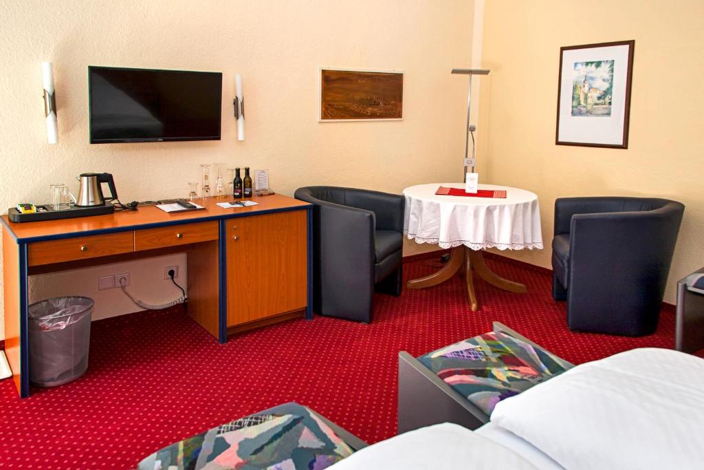 TV a/nebo společenská místnost v ubytování Pension Wehner