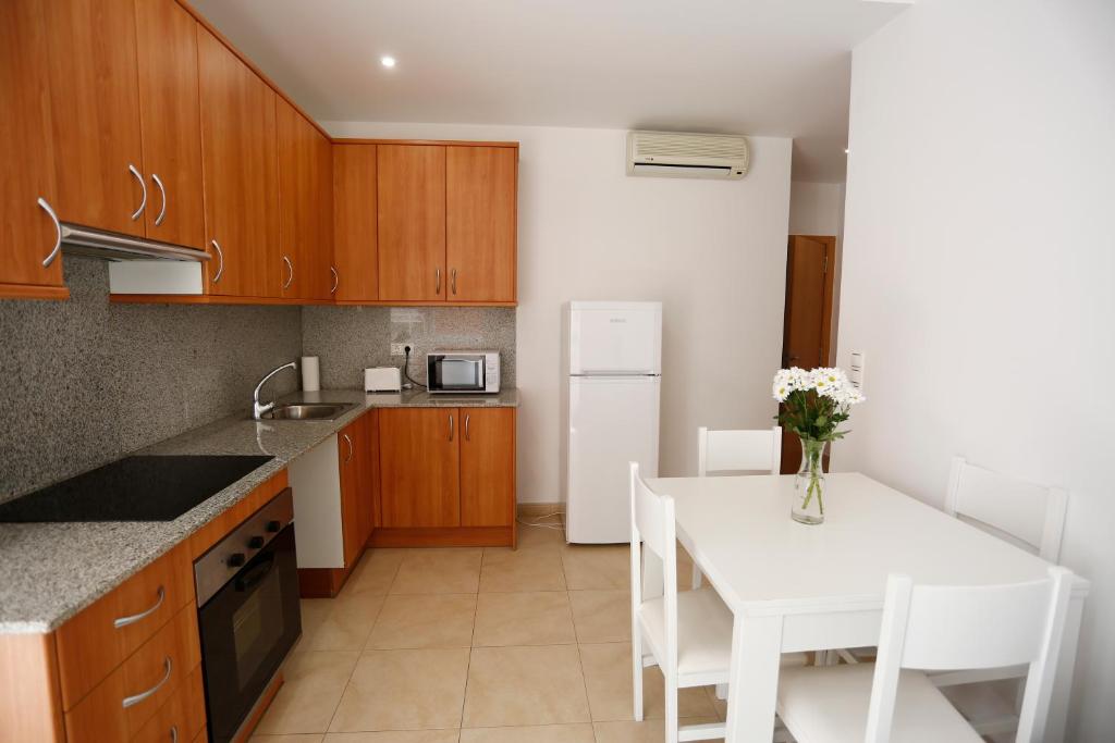 Kuchyňa alebo kuchynka v ubytovaní Apartaments Claudia