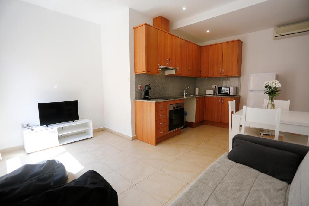Kuchyňa alebo kuchynka v ubytovaní Apartaments Claudia